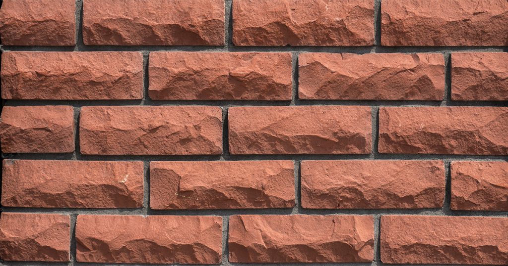 Rock Face Brick RFB 723 in classic red tone with textured surface